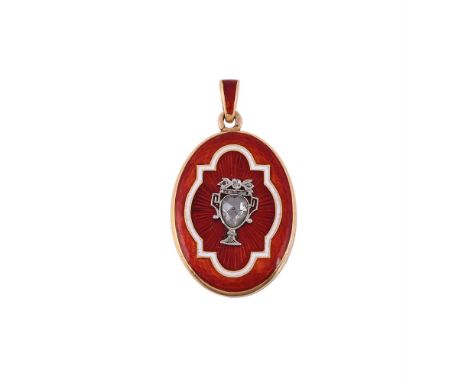 AN EARLY 20TH CENTURY DIAMOND AND RED ENAMEL LOCKET PENDANTThe red guilloche enamelled oval locket with a white border, with 