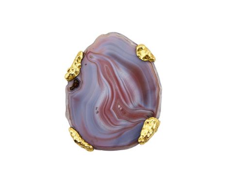 ANDREW GRIMA, A POLISHED AGATE BROOCH/PENDANT  LONDON 1972The polished pale blue, red and white agate with four textured gold