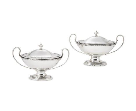 A PAIR OF GEORGE III SILVER SAUCE TUREENS AND COVERSHENRY GREENWAY, LONDON 1777With urn shaped finials to the beaded domed co