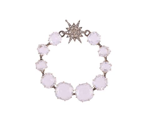 H. STERN, STARS, A DIAMOND AND ROCK CRYSTAL BRACELETThe claw set cushion cut rock crystal links with diamond accented links b