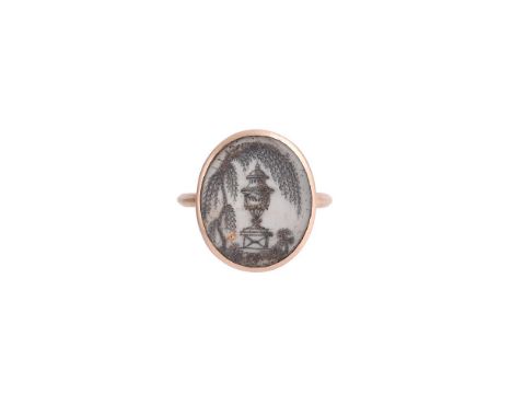 Y AN EARLY GEORGE III MOURNING RING CIRCA 1776The oval ivory panel with a monochrome urn below a weeping willow with snipped 