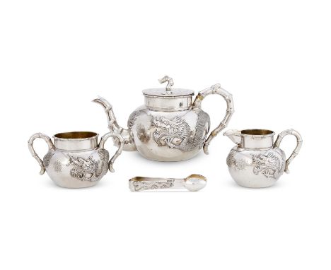 Y A CASED CHINESE SILVER FOUR PIECE CIRCULAR TEA SETLUEN WO, SHANGHAI, CIRCA 1910The tea pot with a bamboo finial to the pres