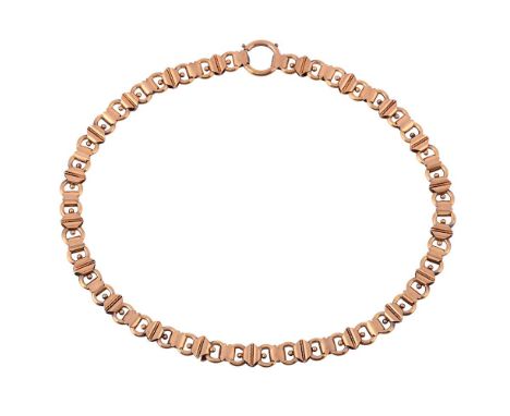 A VICTORIAN 15 CARAT GOLD COLLAR NECKLACE CIRCA 1880The necklace with alternating beaded diamond shaped terminals with a rope
