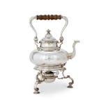 A SILVER KETTLE ON STAND