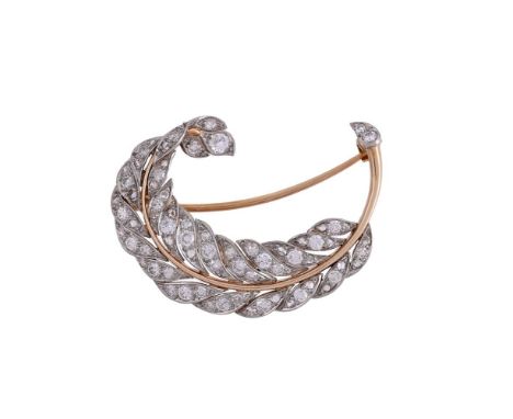 A DIAMOND FEATHER BROOCHThe coiled two colour feather set throughout with brilliant cut, eight cut and rose cut diamonds, app