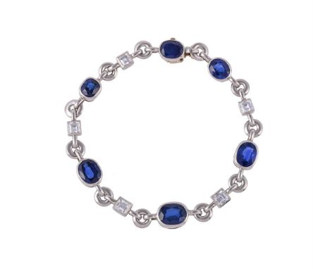 A SAPPHIRE AND DIAMOND BRACELETThe oval cut sapphires interspaced with step cut diamonds, approximately 1.80 carats total, wi