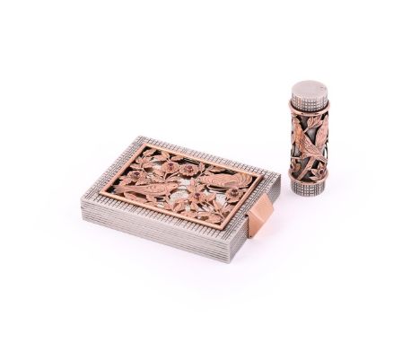 BOUCHERON, A SILVER AND GOLD COLOURED INLAY COMPACT AND LIPSTICK, CIRCA 1940The compact with engine turned borders, pierced a