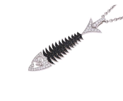 STEPHEN WEBSTER, TOP CAT, A DIAMOND AND SAPPHIRE FISH PENDANT LONDON 2006The stylised fish skeleton with a pavé set brilliant