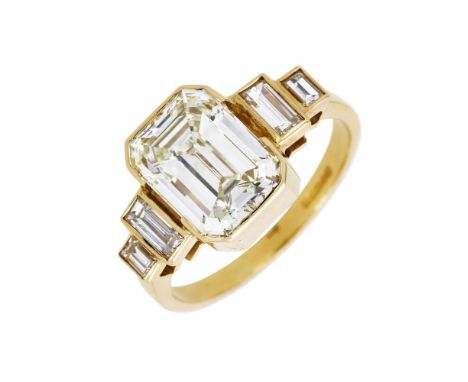 A SINGLE STONE DIAMOND RING LONDON 1996The step cut diamond with canted corners weighing 3.00 carats, to stepped baguette cut