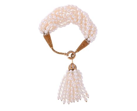 RENÉ BOIVIN, A DIAMOND, GOLD COLOURED AND CULTURED PEARL BRACELETThe multi strand oval freshwater cultured pearl bracelet wit