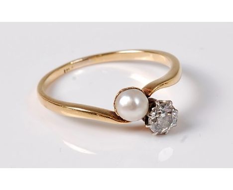 A 'pearl' and diamond 'toi et moi' ring, the 'pearl measuring approx. 4.3mm diameter, the off-round diamond estimated approx.