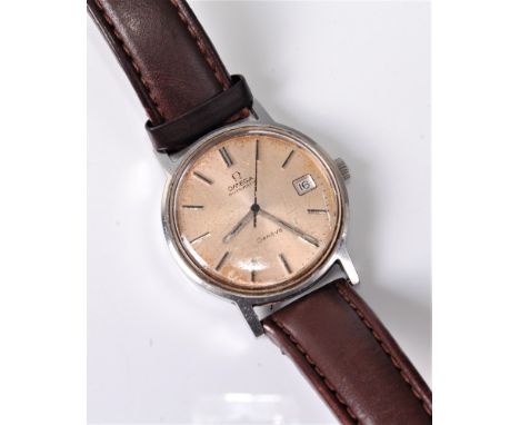 A gentleman's Omega Automatic wristwatch, the buff coloured dial with steel baton numerals, hands and calendar function, stee