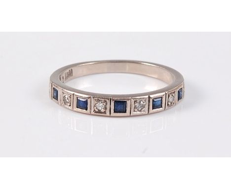 A sapphire and diamond half hoop ring, the single cut diamonds alternating with square cut sapphires, all set in white metal 