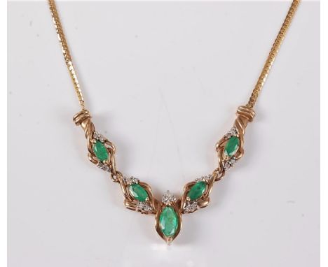 An emerald and diamond necklace, the five marquise shaped emeralds, between approx. 5.3 - 8mm, set amongst overlaping arcs of