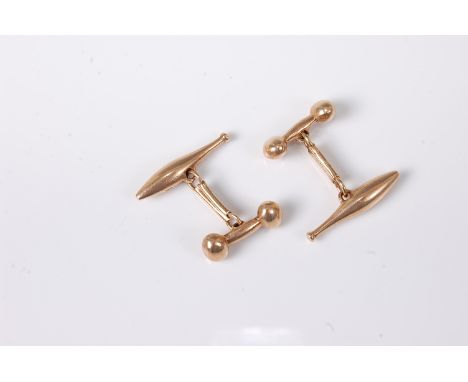 A pair of '9ct' cufflinks, the dumbbell and baton style cufflinks united by a single rectangular link, both ends stamped '9ct