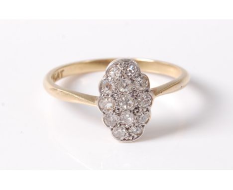 An early 20th century diamond ring, the oval plaque ring set with single cut diamonds, total estimated weight of diamonds est