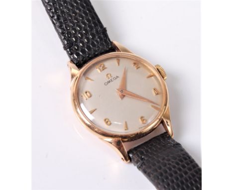 A lady's 18ct Omega wristwatch, the round cream dial with gold baton and Arabic numerals, rose gold hands, gold case, 23mm di