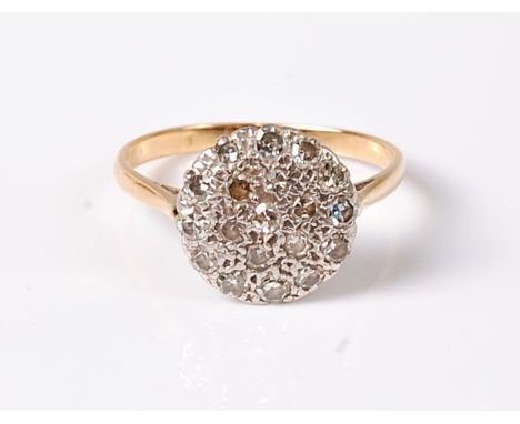 A diamond cluster ring, the 12.5mm disc pave set with single cut diamonds, total estimated approx 0.38cts, all set in white m