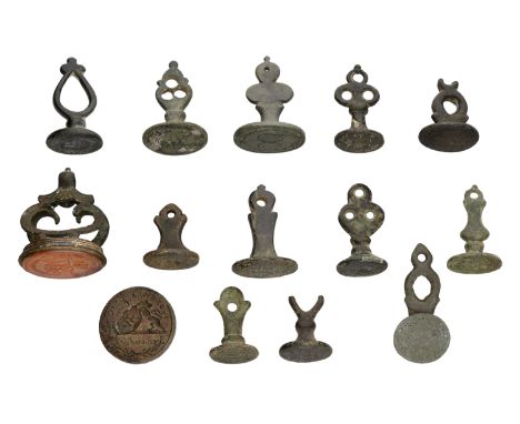 Post-Medieval, Jewish brass Seal Matrices (14), all with Hebrew inscriptions and different suspension loops, including trefoi