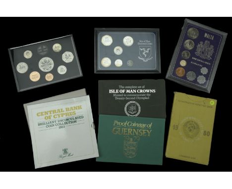 Guernsey, Elizabeth II, Proof sets (2), 1979, 1986 (KM. PS8, PS11); ISLE OF MAN, Elizabeth II, Proof-like set, 1980 (KM. PL1)