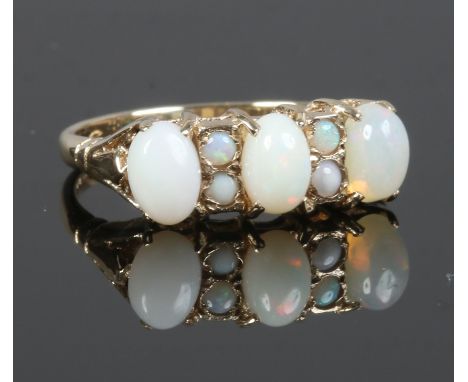 A 9ct gold and opal ring, size M1/2.