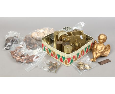 A box of clock spares to include fusee movement, brass Vienna weights winding keys and a gilt cherub mount.