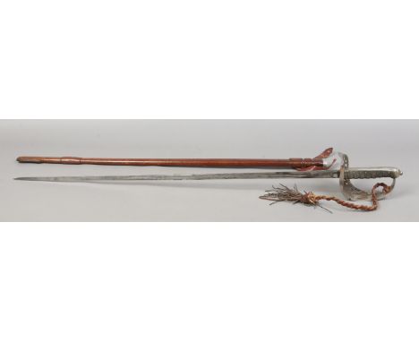 A World War I officers infantry sword in leather mounted scabbard.