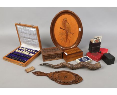 A collection of wooden wares including Sorento ware, mirror, marquetry panel, cribbage board and playing cards etc.