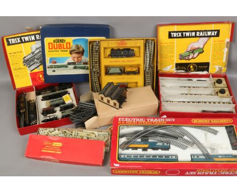 A collection of model railway engines, carriage tracks etc to include Trix twin railway, Hornby Dublo etc.