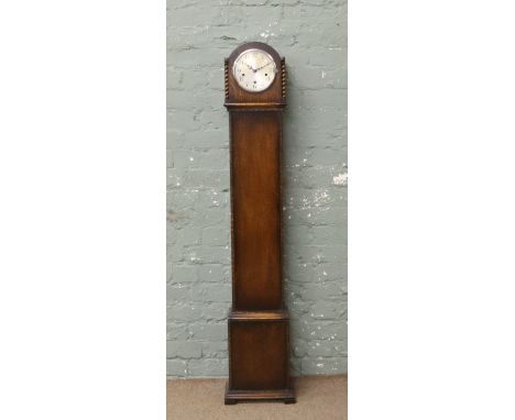 A mid C20th oak cased granddaughter clock with Enfield 30 hour movement.