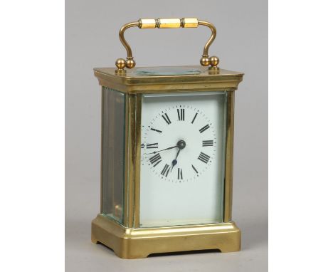 A C19th French brass cased 8 day carriage clock with enamel dial and sold with key. Condition Report. To be used as a guide o