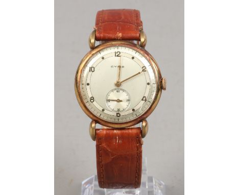 A gentlemans Cyma manual gold plated wristwatch 1946-47. With teardrop lugs and silvered dial, Arabic numeral markers and sub