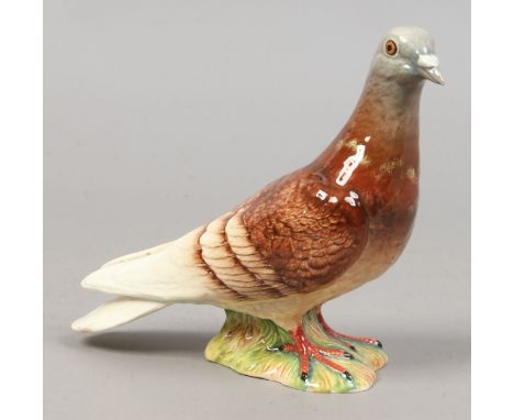 A Beswick model of a pigeon 1383.