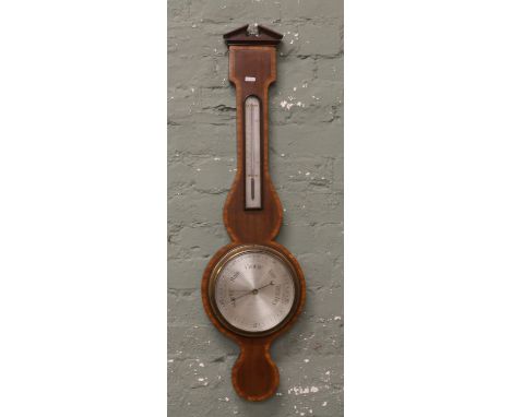 An Edwardain mahogany banjo barometer crossbanded in satinwood.