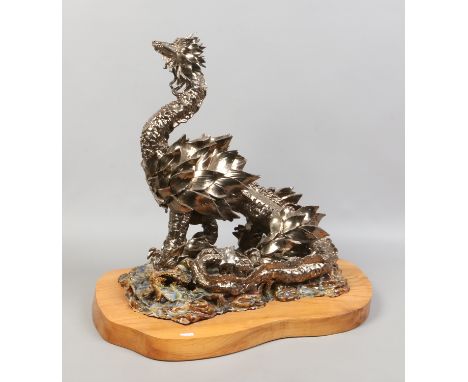 A large Val Lister ceramic sculpture of a dragon raised on hardwood plinth. Condition Report. To be used as a guide only. min