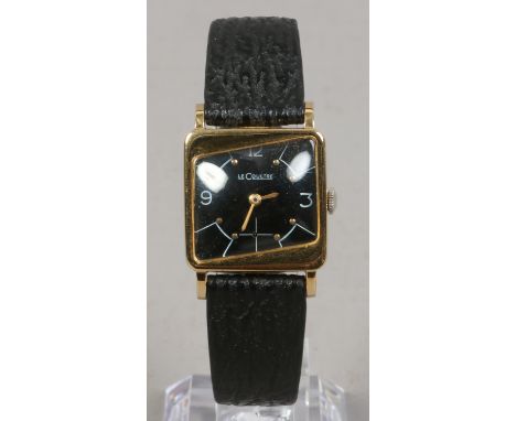 A 1950s Jaeger Le Coultre gold capped manual wristwatch with black rhombus dial. Condition Report. To be used as a guide only