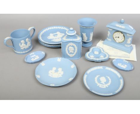 A quantity of Wedgwood Jasperwares including The Josiah Wedgwood bicentenary clock, commemorative loving cup, plates, trinket