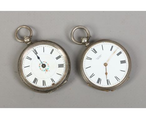 Two silver cased fob watches with white enamel dials.    Condition Report. To be used as a guide only.  Both missing glass.