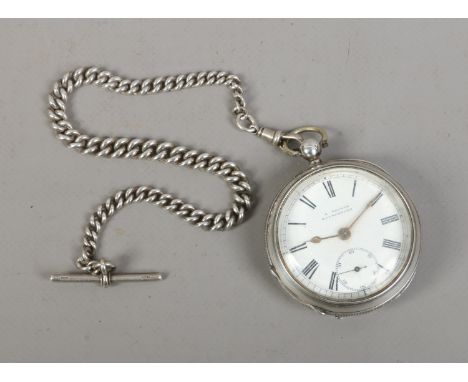 An Edwardian silver pocket watch with enamel dial and subsidiary seconds, assayed Birmingham 1901 on silver single Albert cha