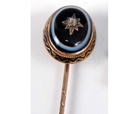 A yellow metal banded agate and diamond mourning stick pin, comprising a 16 x 12.6mm banded agate cabochon, with a 1.8 x 1.85