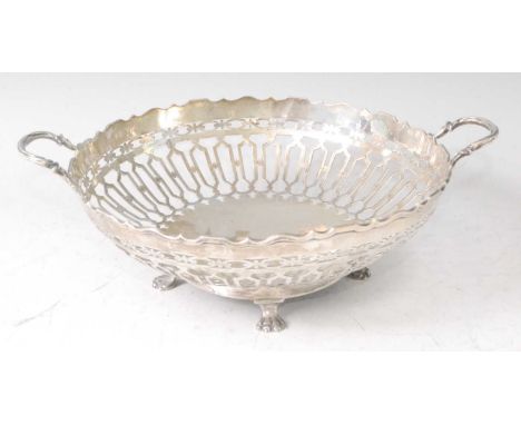 A George V silver fruit bowl, of pierced circular form and raised on claw feet, 11oz, maker William Hutton &amp; Sons Ltd, Sh