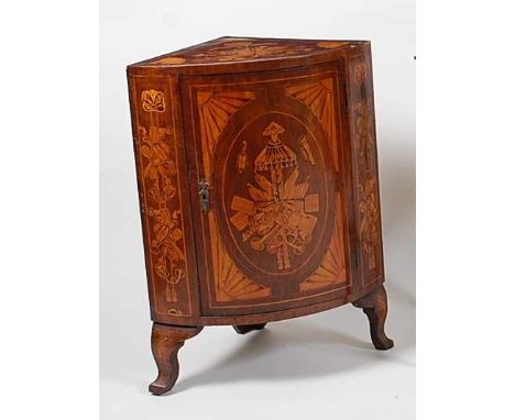 *An antique Dutch walnut and marquetry inlaid bowfront corner cupboard, on bracket feet, 18th century and later, h.74cm, d.40