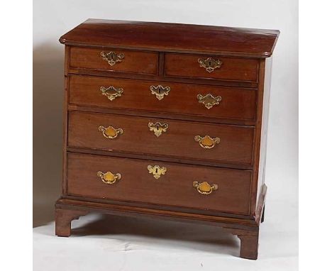 A George III mahogany squarefront chest, the top having a moulded edge, over two short and three long graduated drawers with 