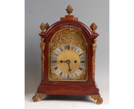 An Edwardian mahogany and gilt brass mounted bracket clock, having an unsigned brass dial with silvered chapter ring, twin wi