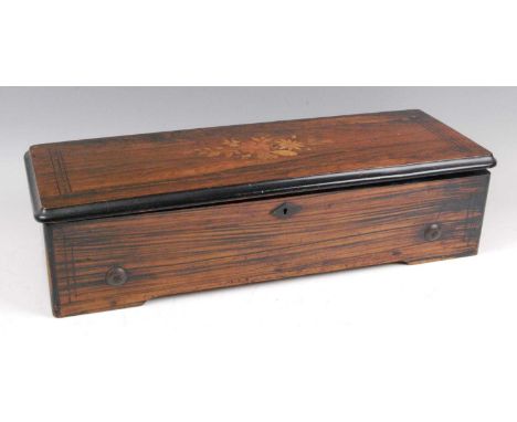 A late 19th century Swiss rosewood cased music box, the 13" cylinder playing twelve airs, with stop/start and change/repeat f