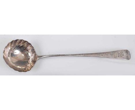 A mid-18th century silver soup ladle, in the Old English pattern, having armorial engraved terminal and half-fluted bowl, 4.3