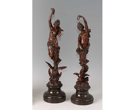 Paul Aichele (1859-1910) - Industry and Wisdom, pair of bronze allegorical maidens, Industry stands upon a wheel and Wisdom u