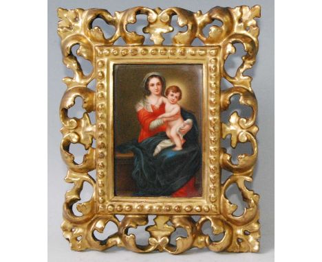 19th century Italian school - Madonna and Child, enamel on porcelain plaque, 13 x 8.5cm, with label verso for C&amp;A Schwick