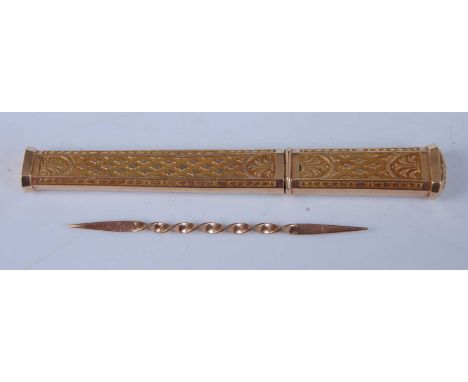 A 19th century continental yellow metal needle / toothpick case, of engine turned and canted rectangular form, unmarked but t
