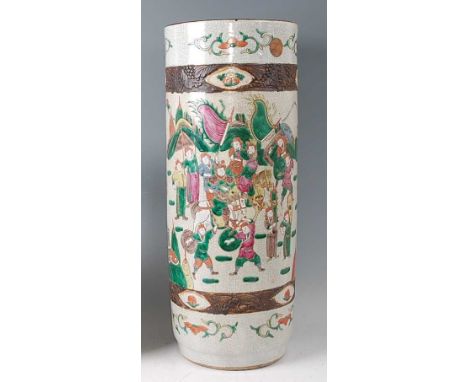 *A Chinese stoneware crackle glaze cylindrical floor vase, enamel decorated in the famille verte palette with medieval warrio